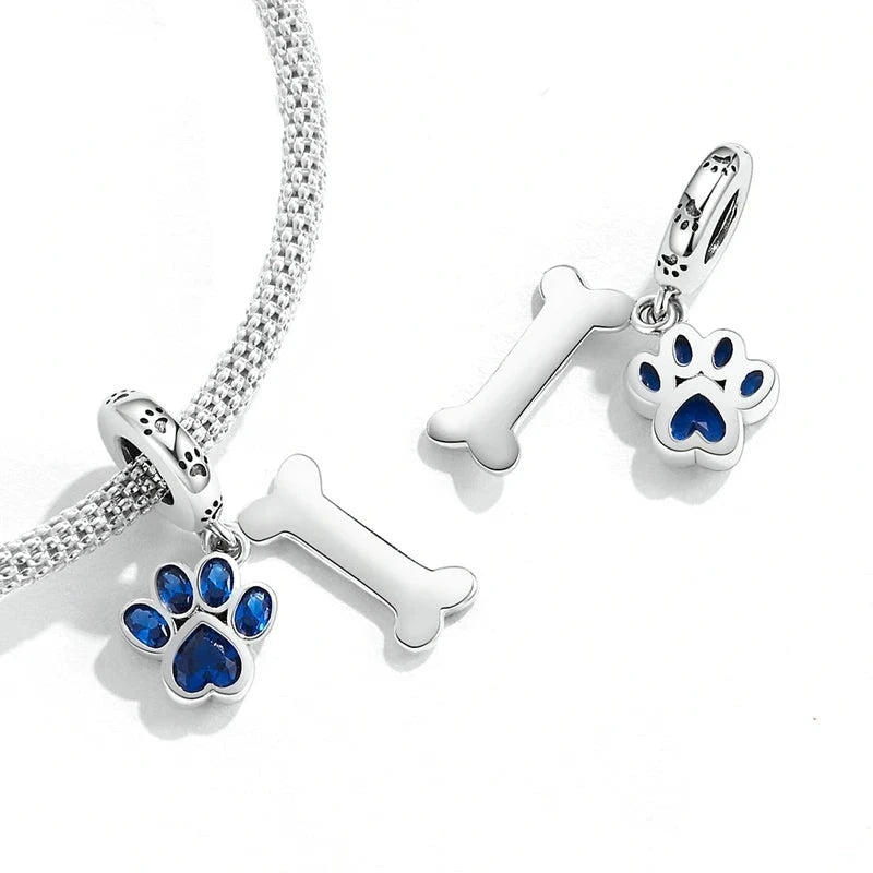 Silver Paw & Bone Charm blue